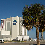 CRS-3 Scrub 1 Bill: VAB with palm trees