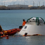 304th Rescue Detachment Conducts At-Sea Training with Boeing Starliner: Attaching the Inflation Ring