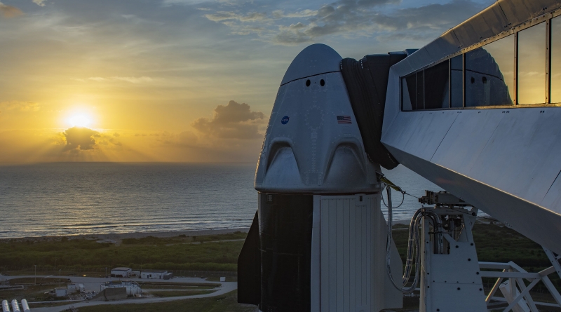 The sun rises over Kennedy Space Center's Launch Complex 39A and SpaceX's Crew Dragon capsule.  Official SpaceX Photo.