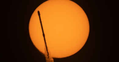 SpaceX's Falcon 9 transits the face of the Sun on its journey to space.  Photo credit: Michael Seeley / We Report Space
