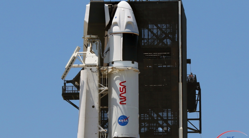 SpaceX's Falcon 9 rocket and Crew Dragon capsule stand tall atop Launch Complex 39A, ahead of Friday's planned liftoff to the International Space Station.  Photo credit: Michael Howard / We Report Space