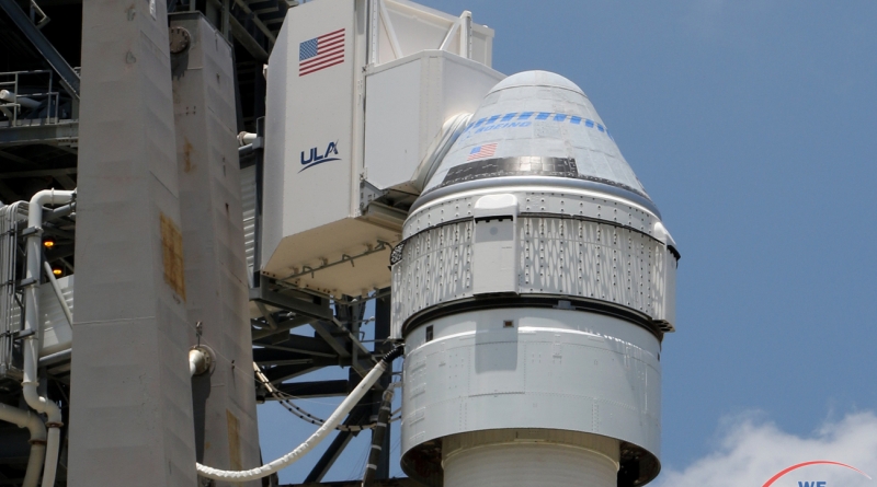 Boeing's Starliner capsule, atop an Atlas V launch vehicle, stands ready at Space Launch Complex 41, Cape Canaveral Space Force Station.  Photo credit: Michael Howard / We Report Space
